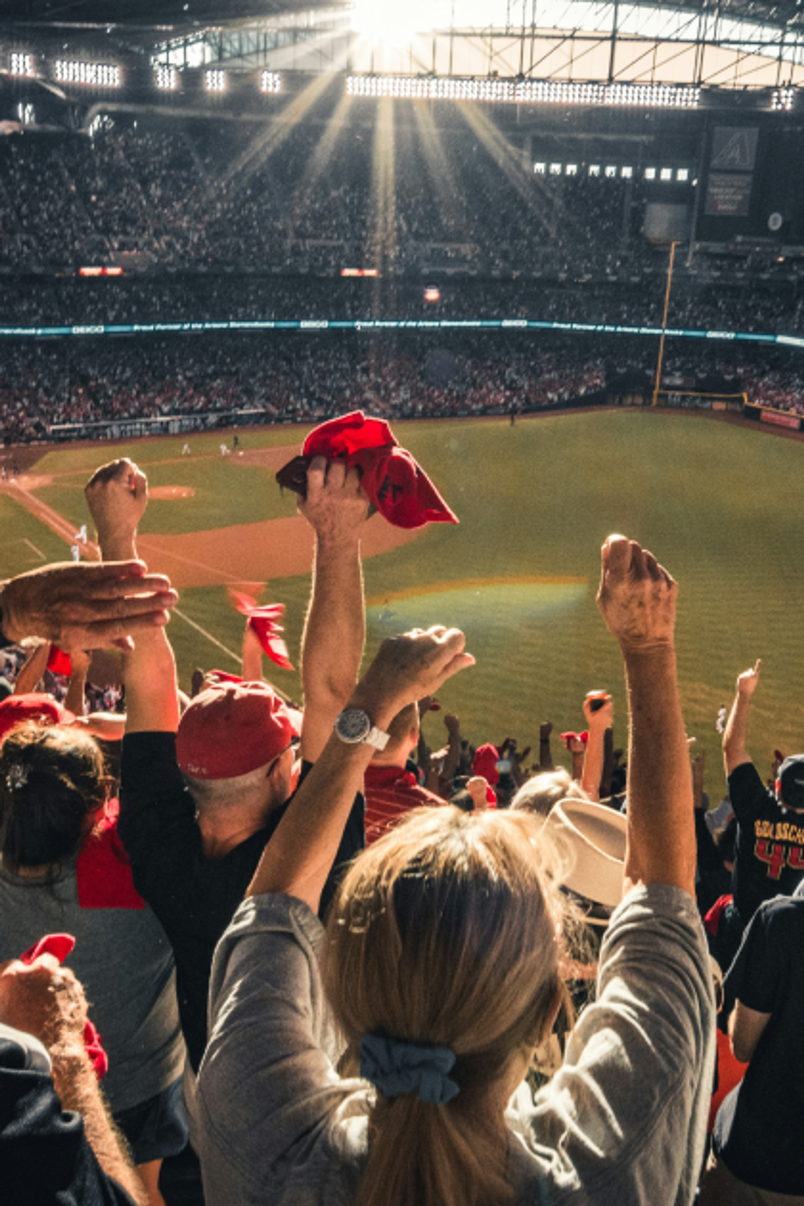 Close up of cheering fans at a sporting event