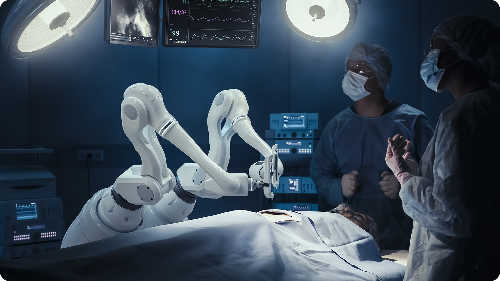Surgeons observing a medical robot performing surgery