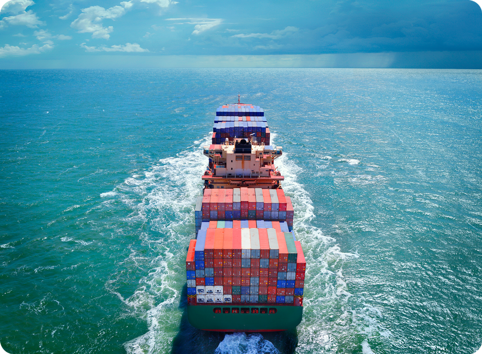 Aerial view of a cargo ship from behind