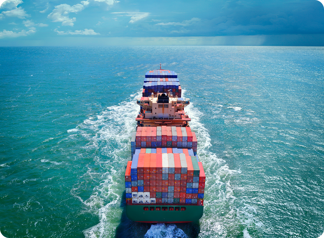 Aerial view of a cargo ship from behind