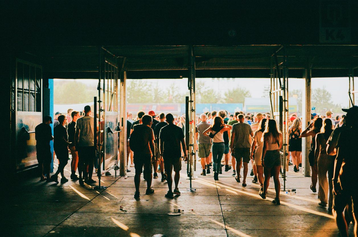 Crowd of people entering music festival