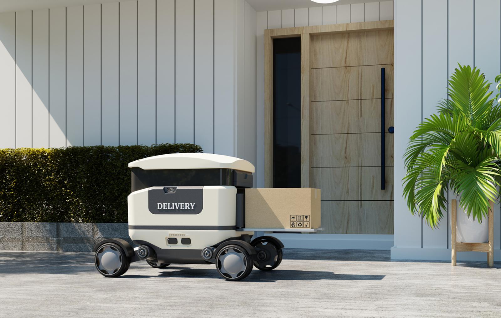 Delivery robot with a package outside a house front door