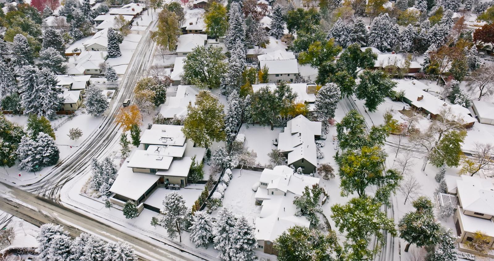 Aerial image of the snowcapped houses in Denver