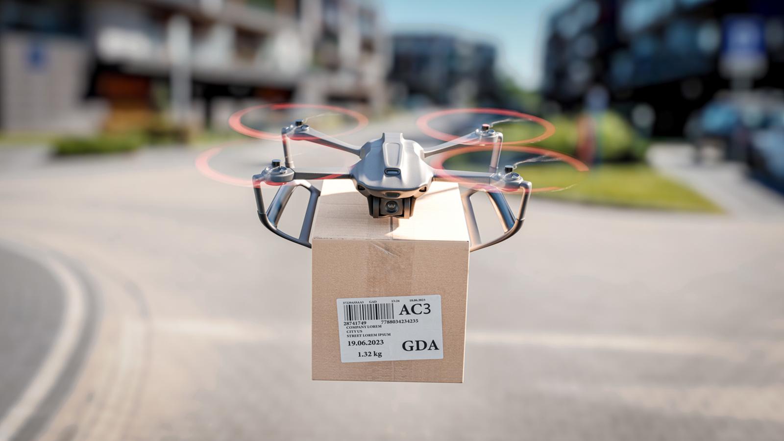 A delivery drone with a brown shipping package