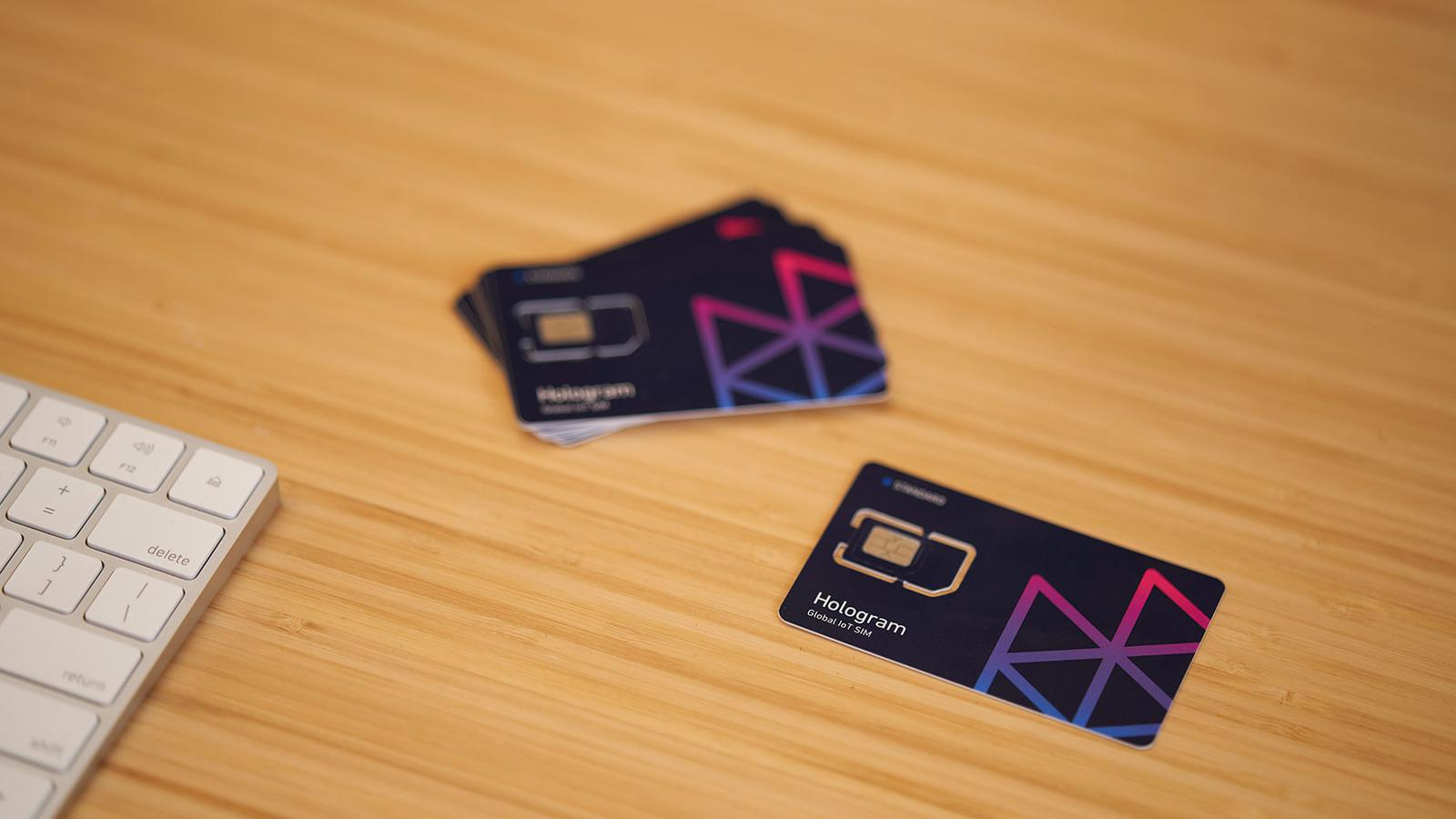 Hologram SIM cards sitting on a desk