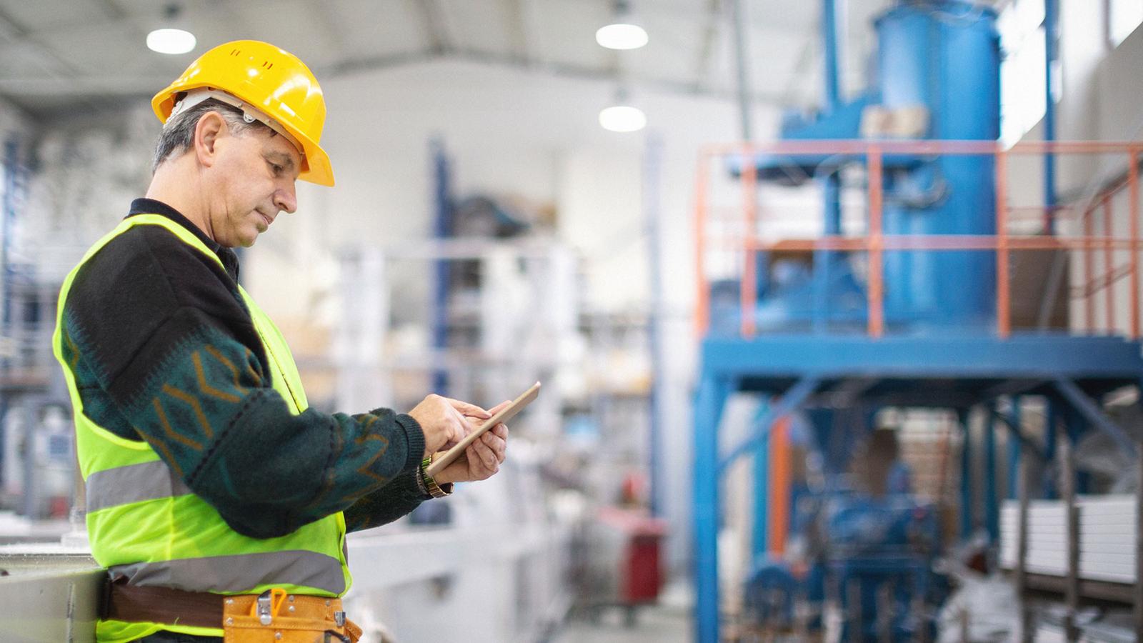 man working at manufacturing facility