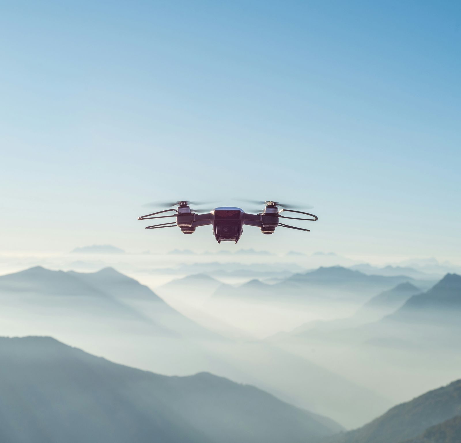 A drone flying in the mountains