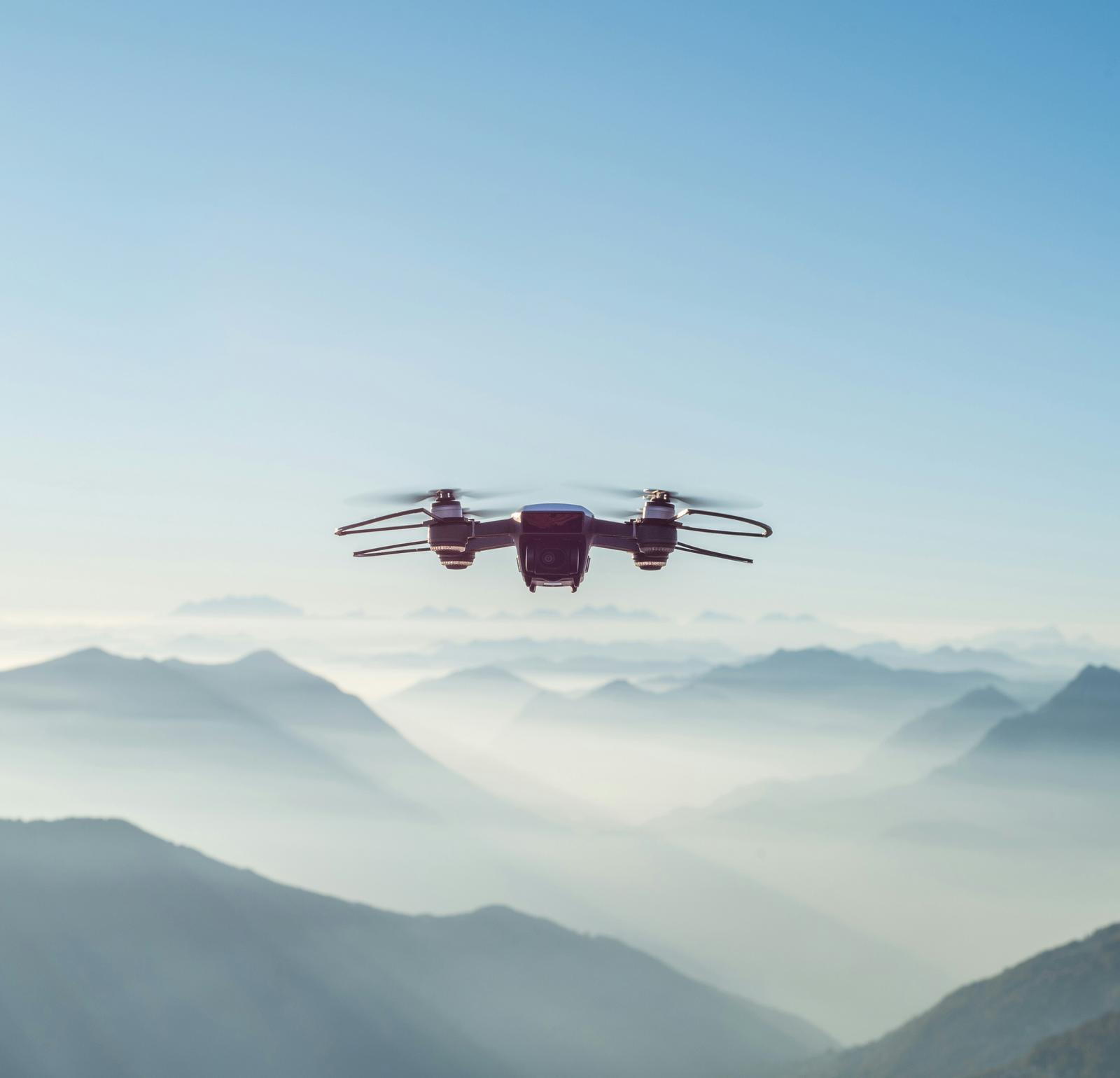 A drone flying in the mountains