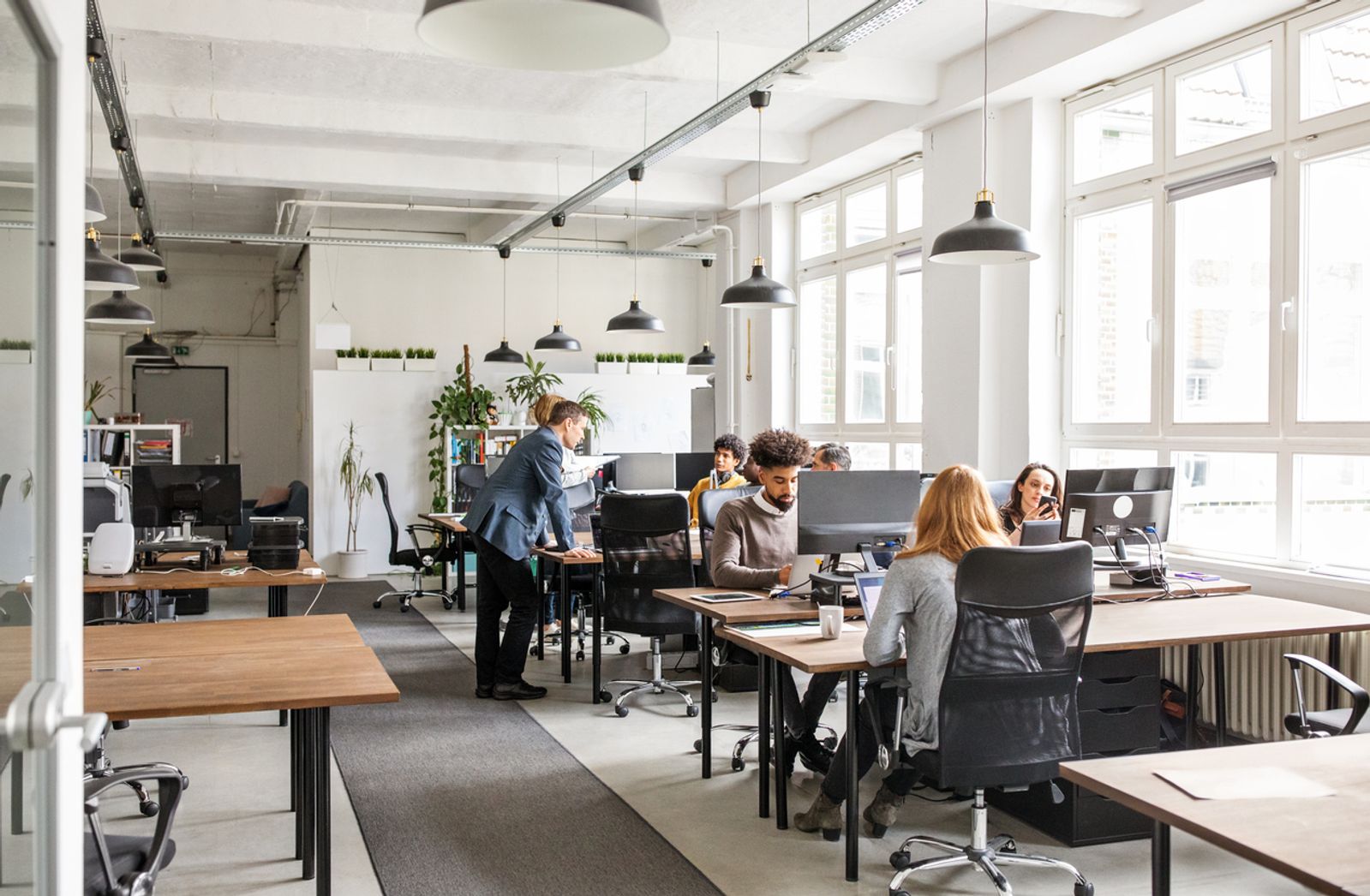  Business people working in modern office space