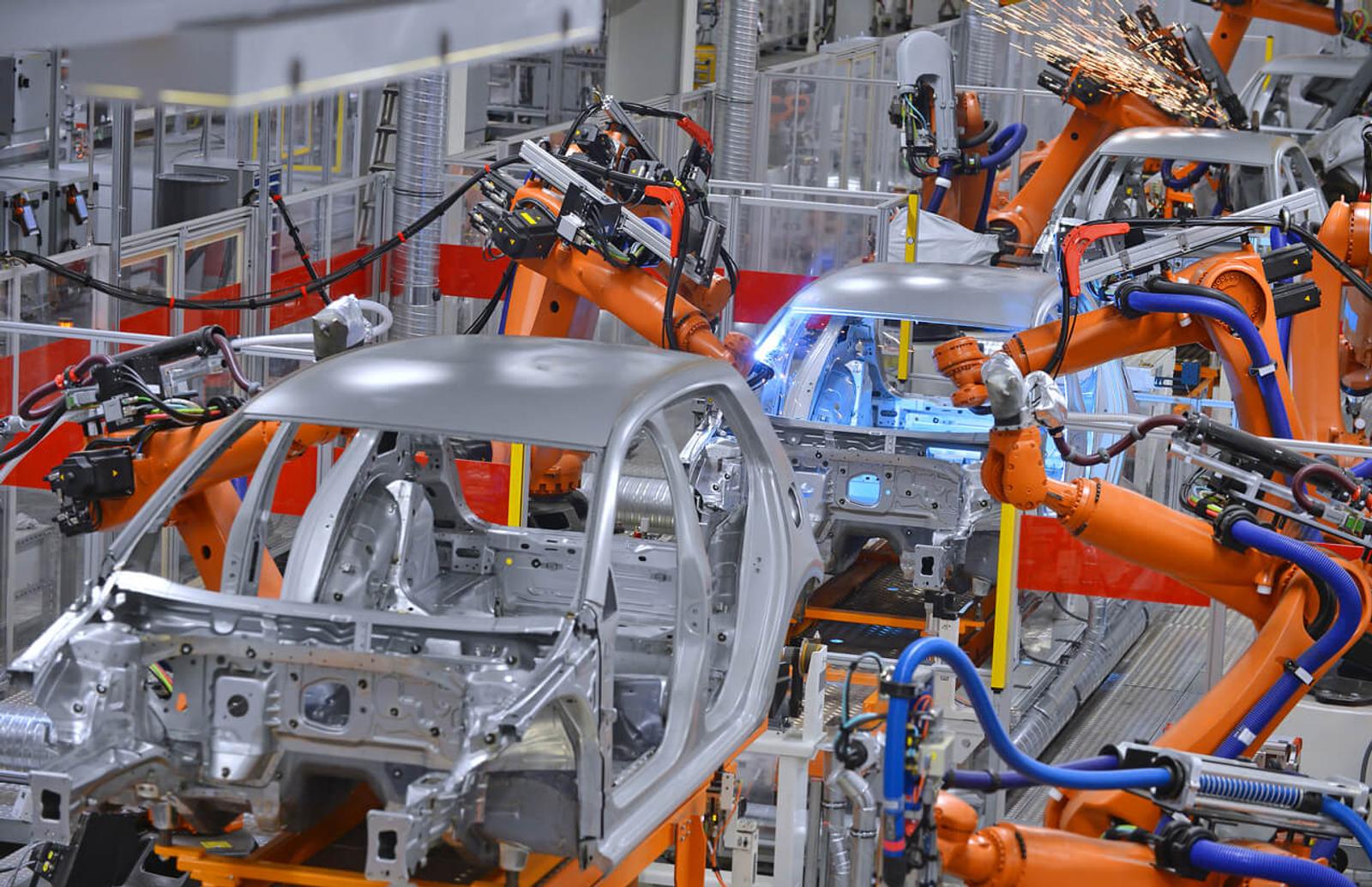 A vehicle assembly line powered by robotic arms