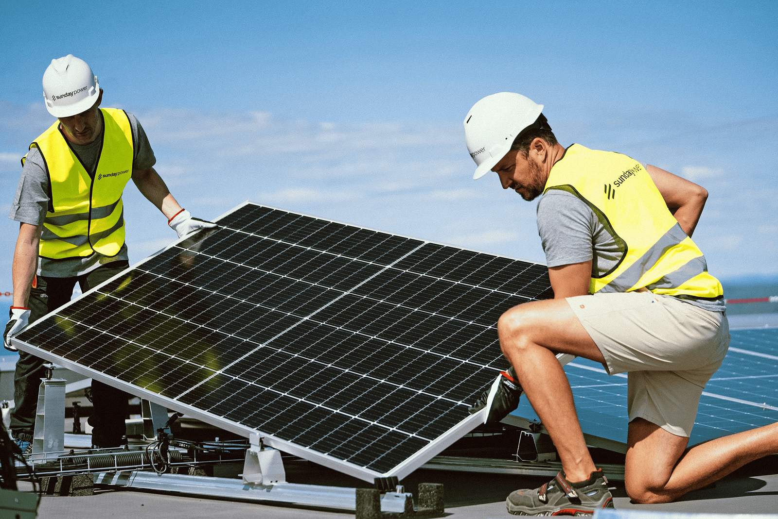 Sunday Power installs solar panels on a rooftop