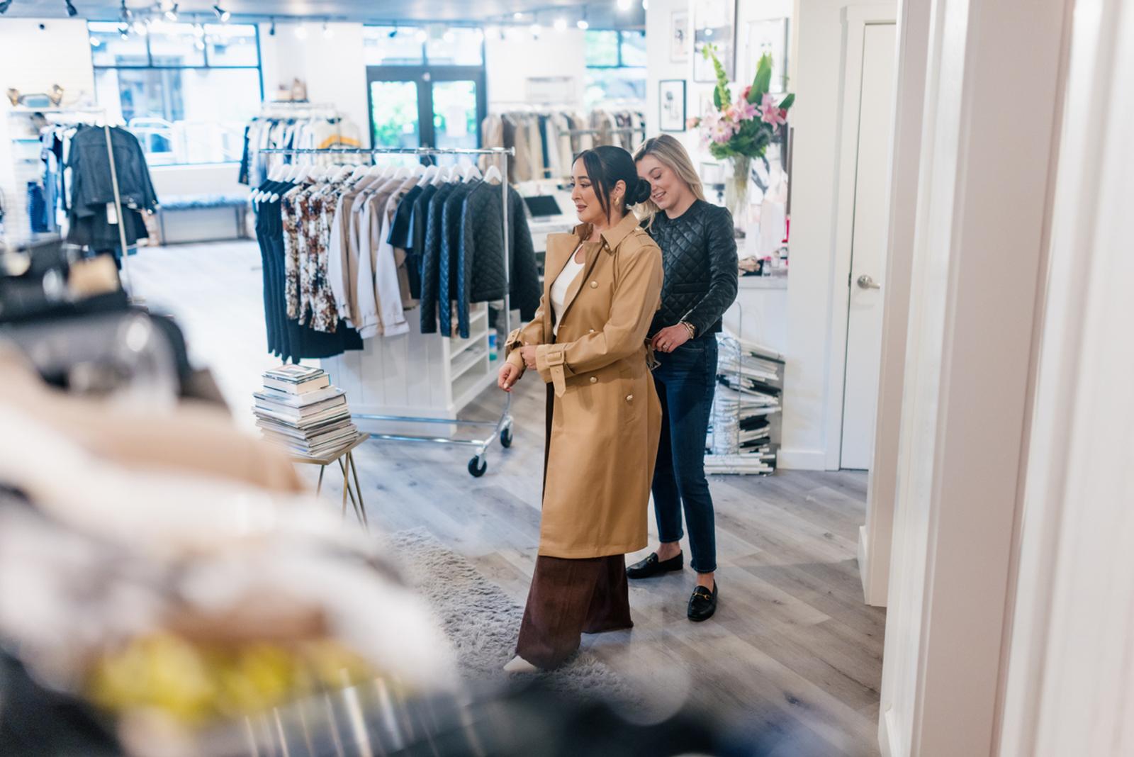 shoppers in woman's clothing store