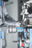 Machine operator with a piece of industrial equipment