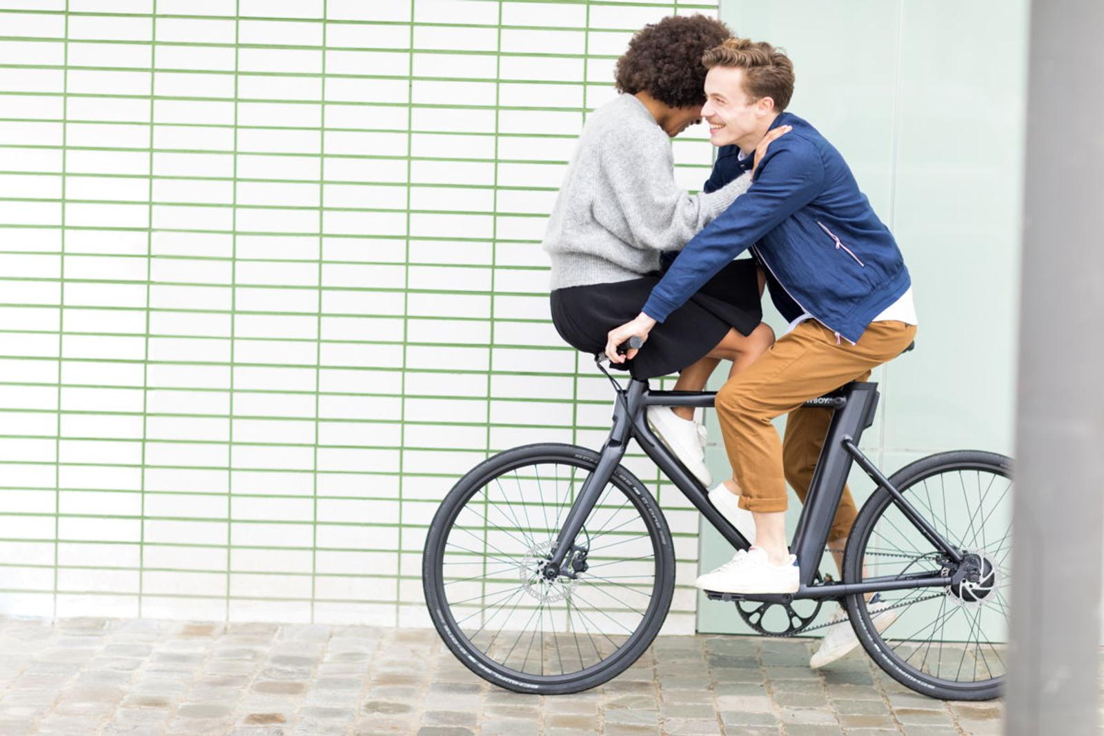 Man and woman on Cowboy Bike