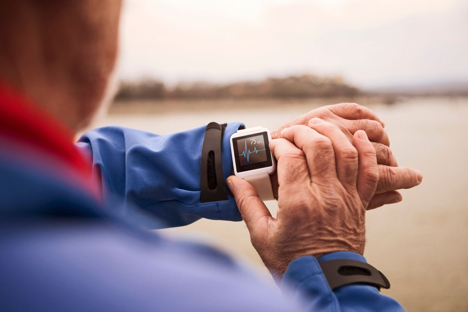 Person using Smart Watch measuring heart rate