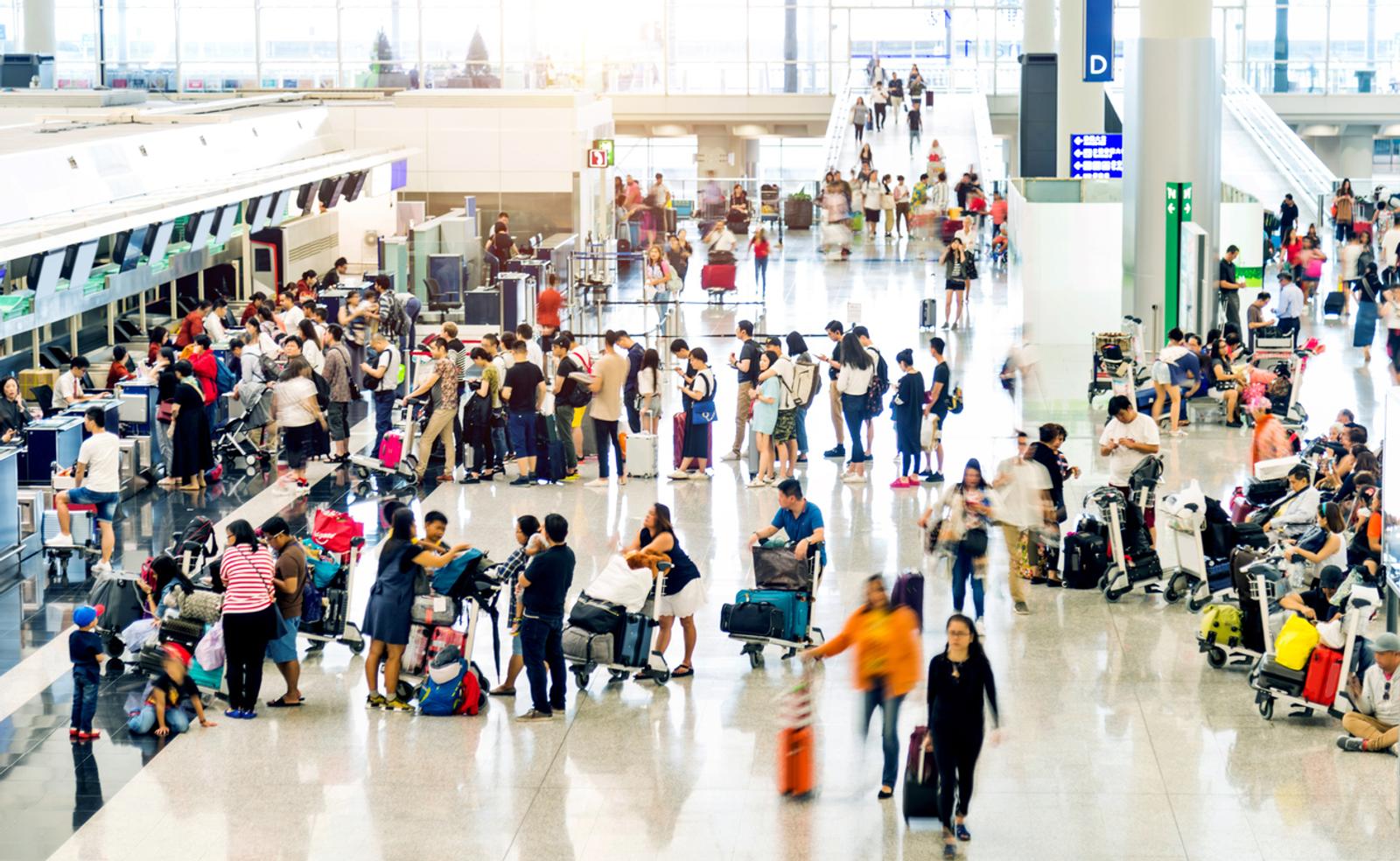 Crowd of people waiting for check-in