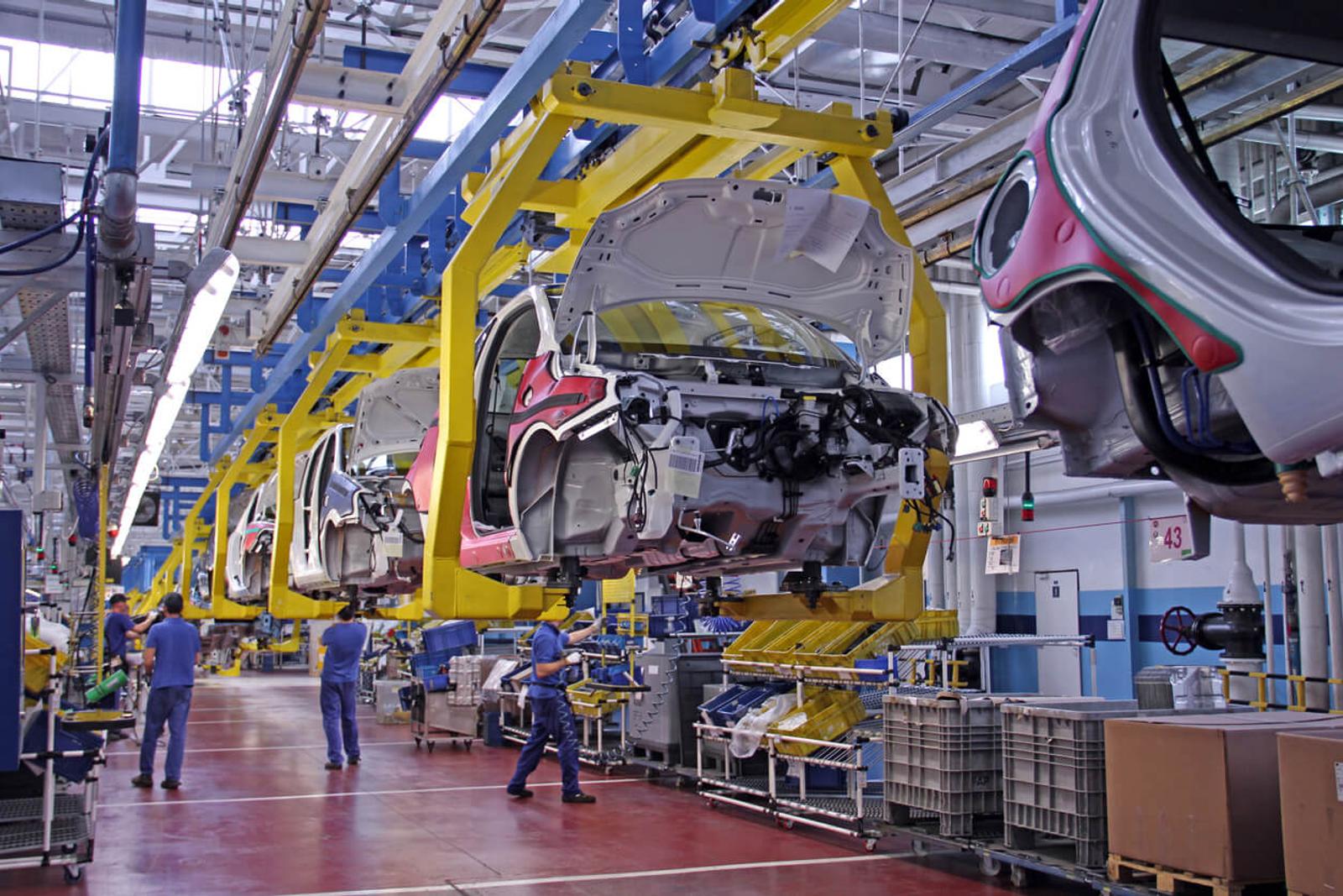 Cars in a production line at a factory