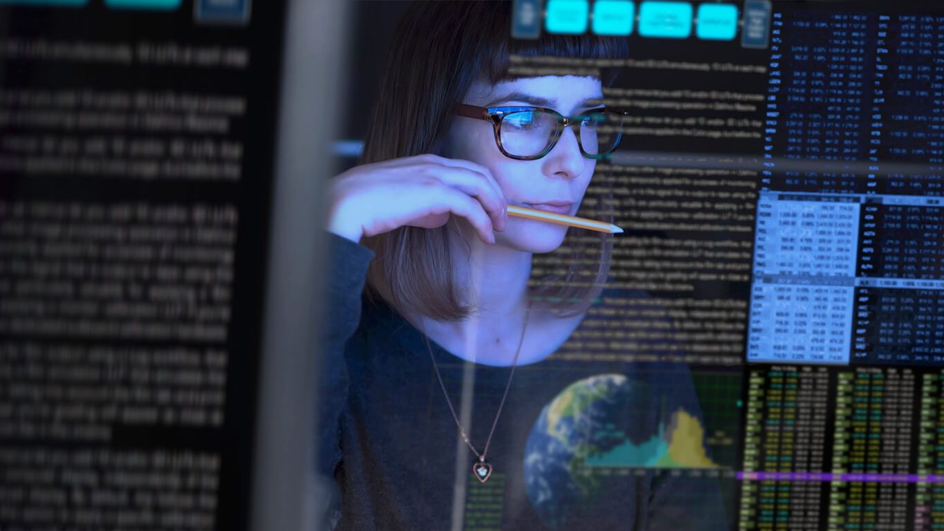 Woman looking at screen code