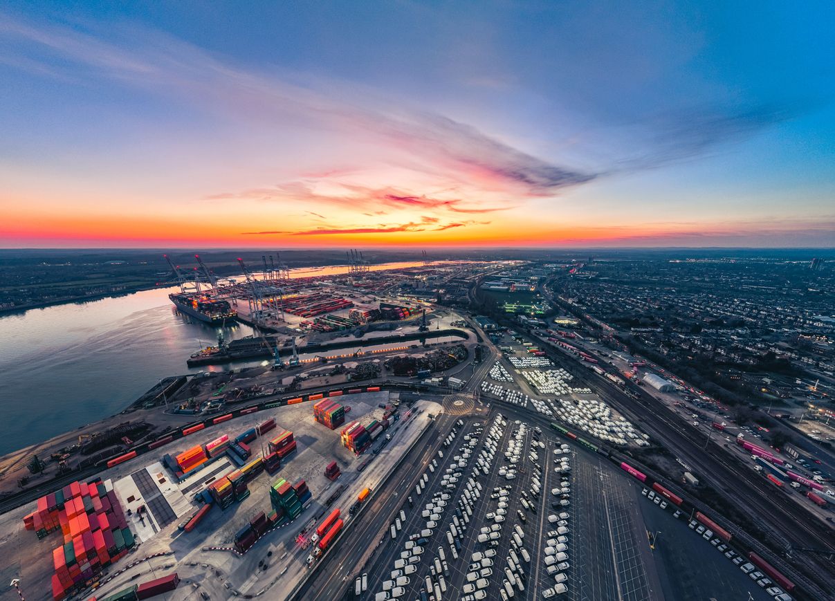Aerial view of the Southampton container port with cargo ships and cranes, showcasing global trade and logistics