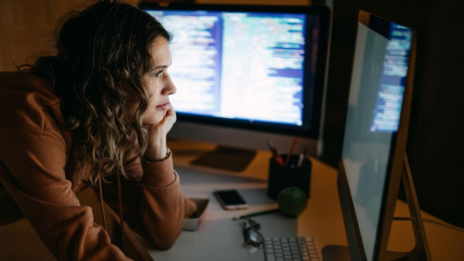 woman using an IoT development tool