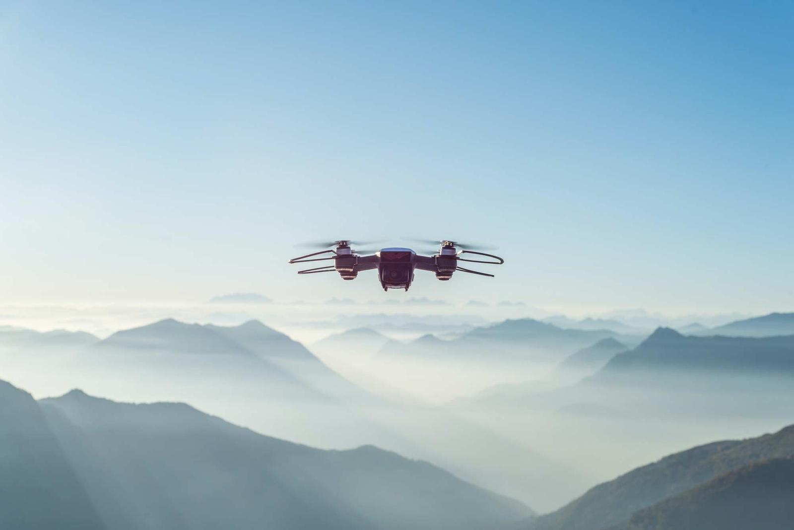 Drone flying above a mountain range