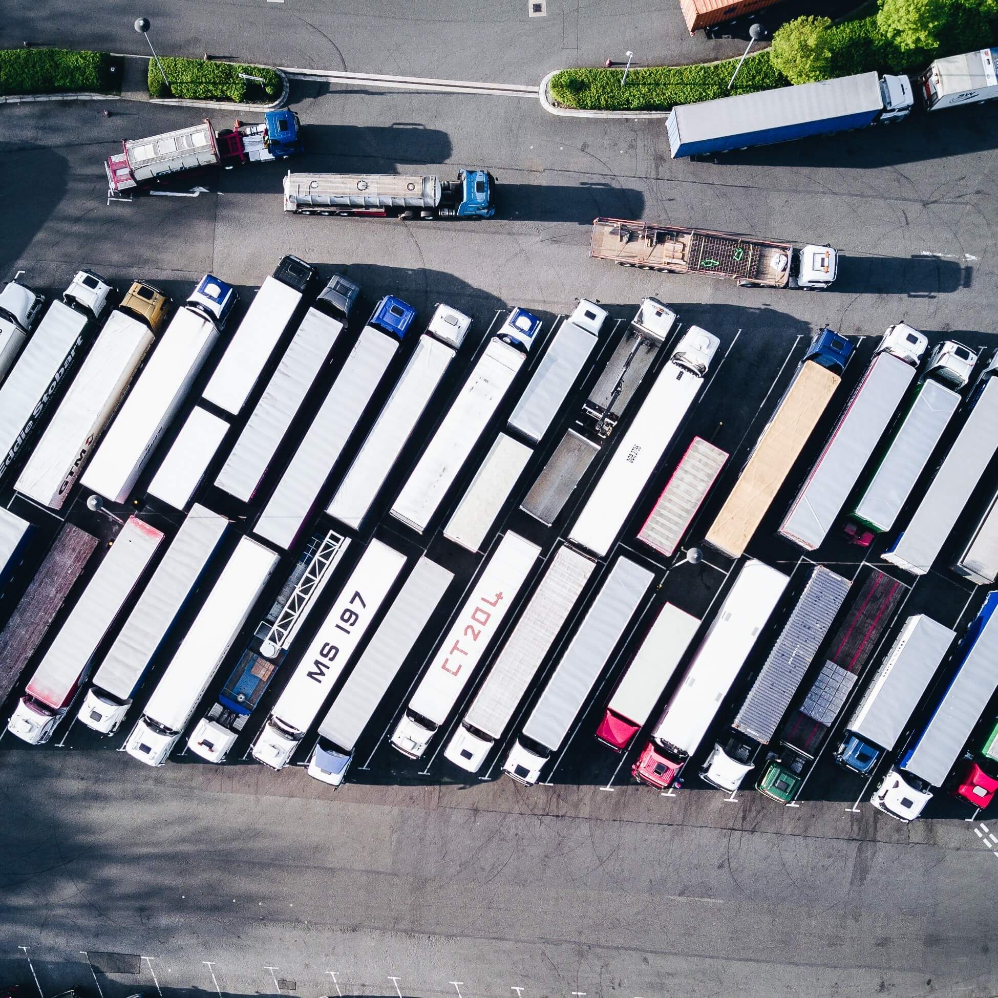Aerial view of multiple truck fleets