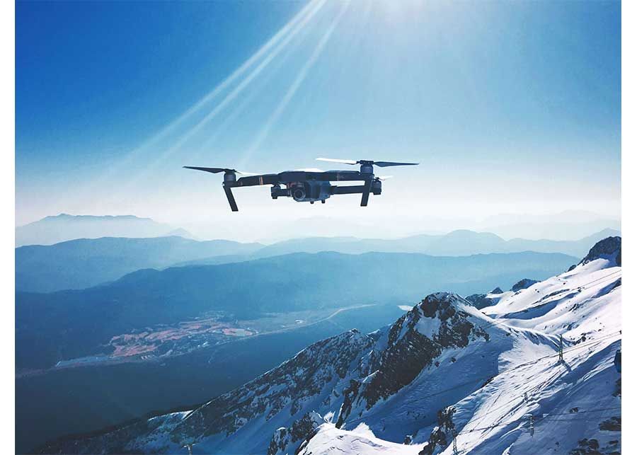 Drone flying over mountain