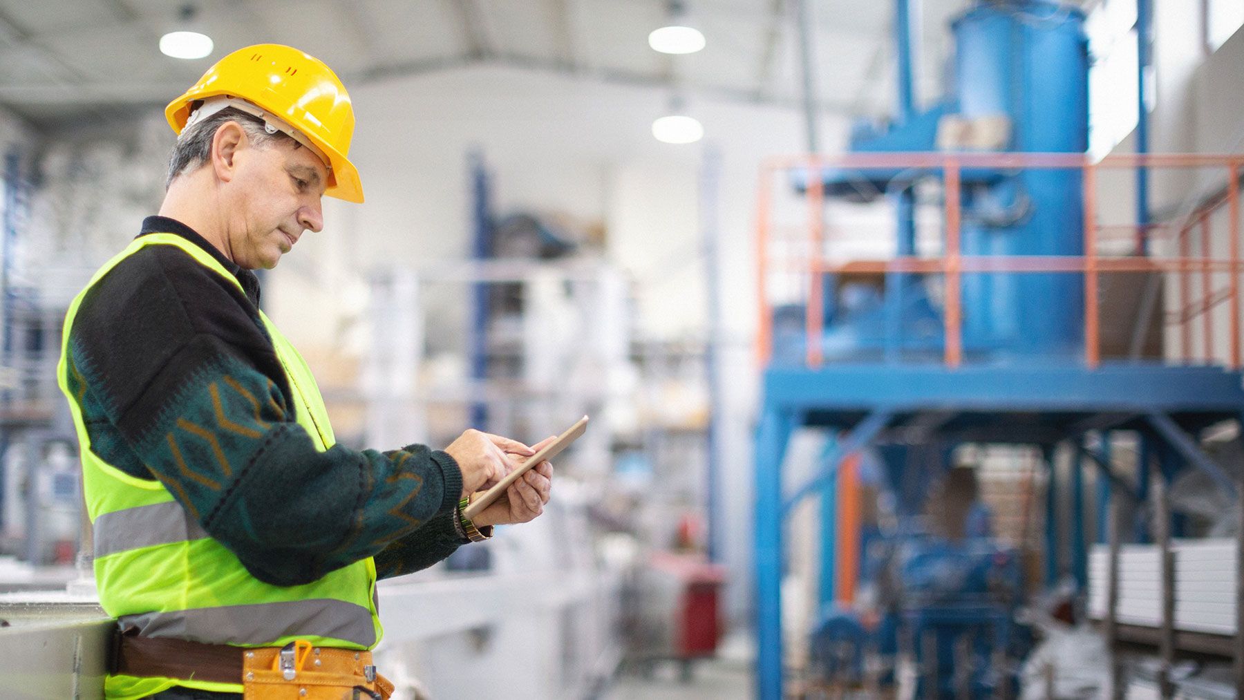 man working at manufacturing facility