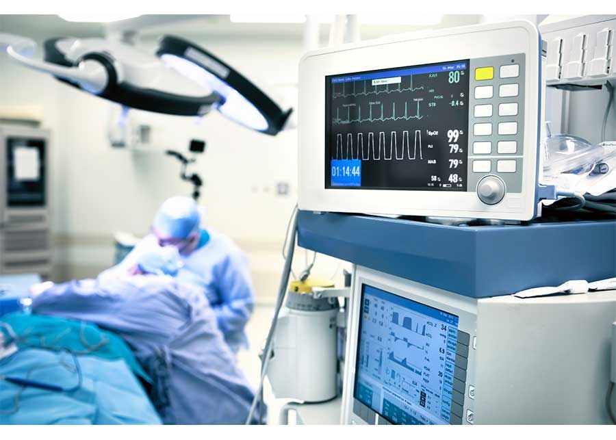 heart monitor and other medical equipment in a hospital room