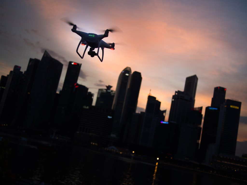 Drone flies over city
