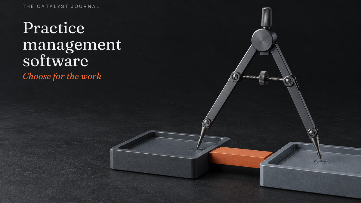 Graphite precision divider spanning two work trays with a terracotta calibration bridge.