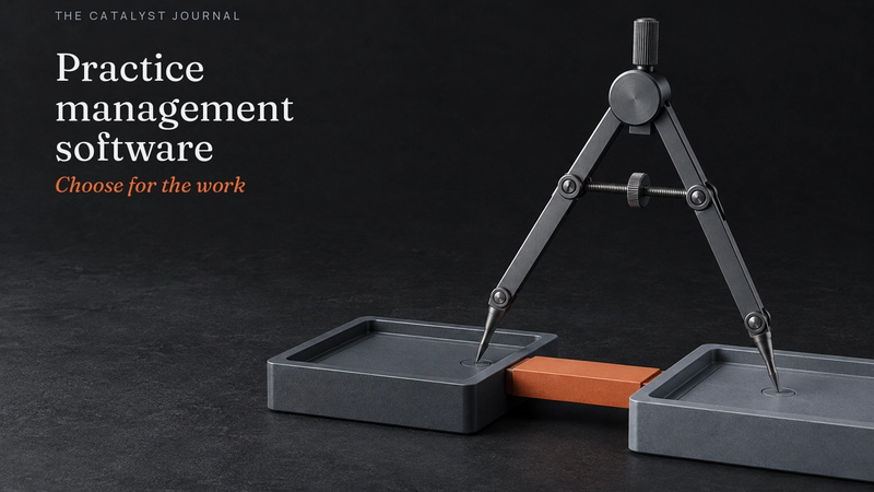 Graphite precision divider spanning two work trays with a terracotta calibration bridge.