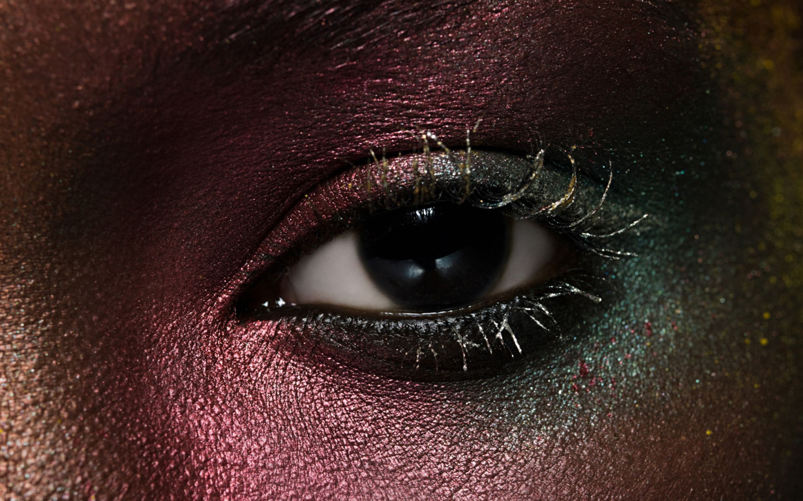 Close up of eye with colourful eyeshadow