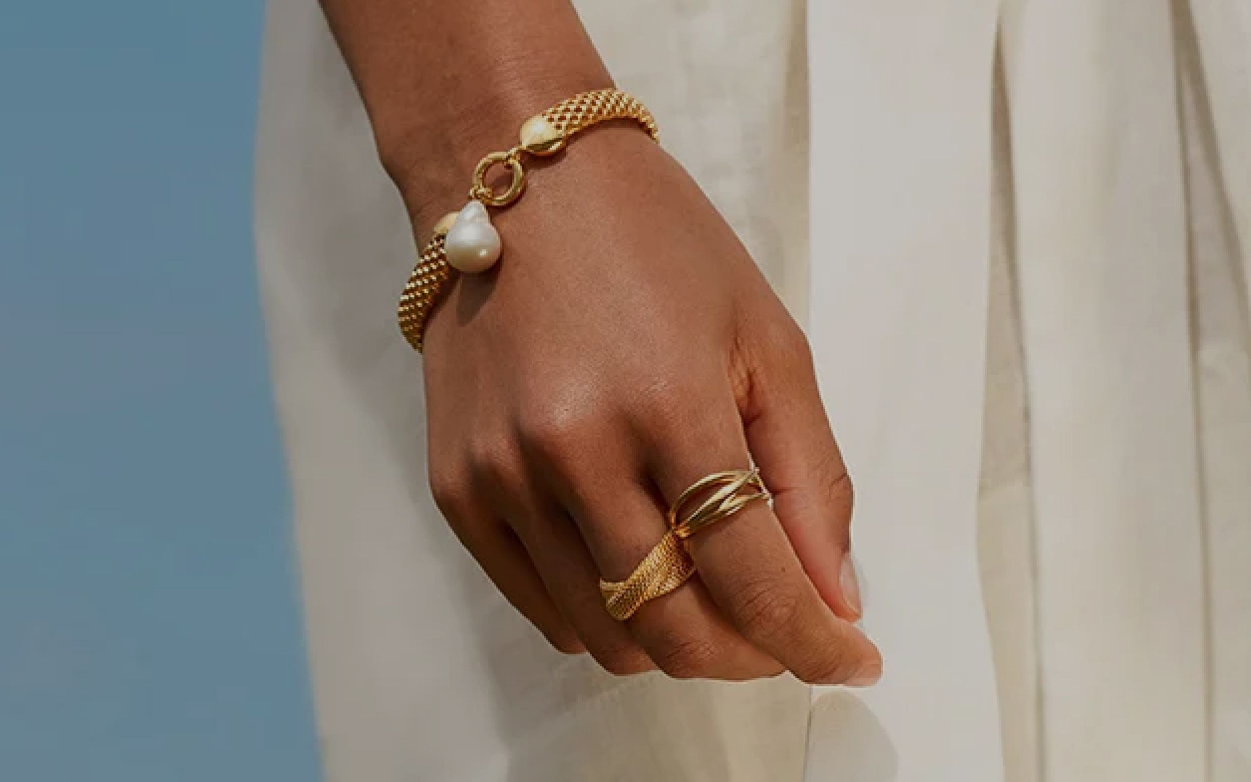 Women's hand wearing jewellery
