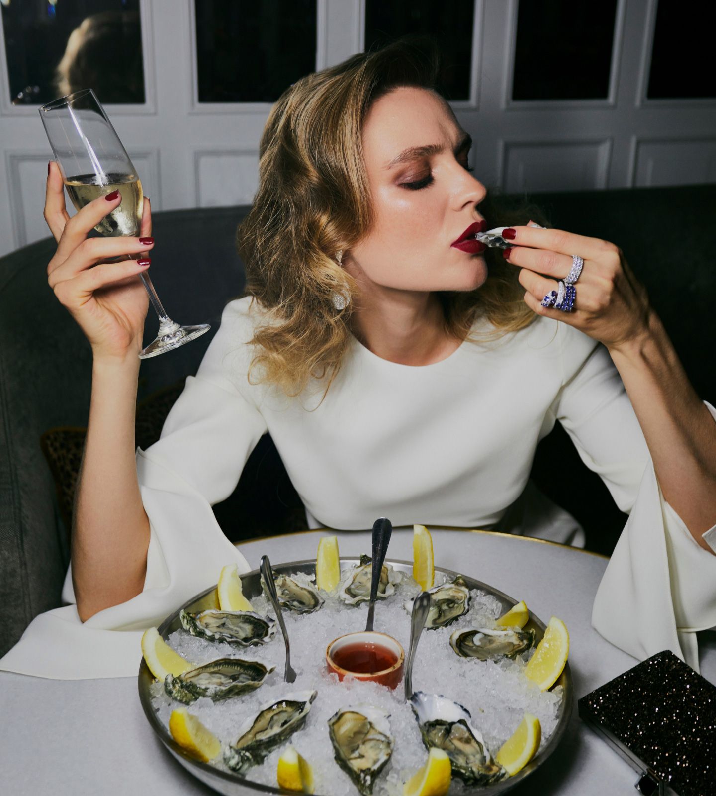 Woman eating oysters
