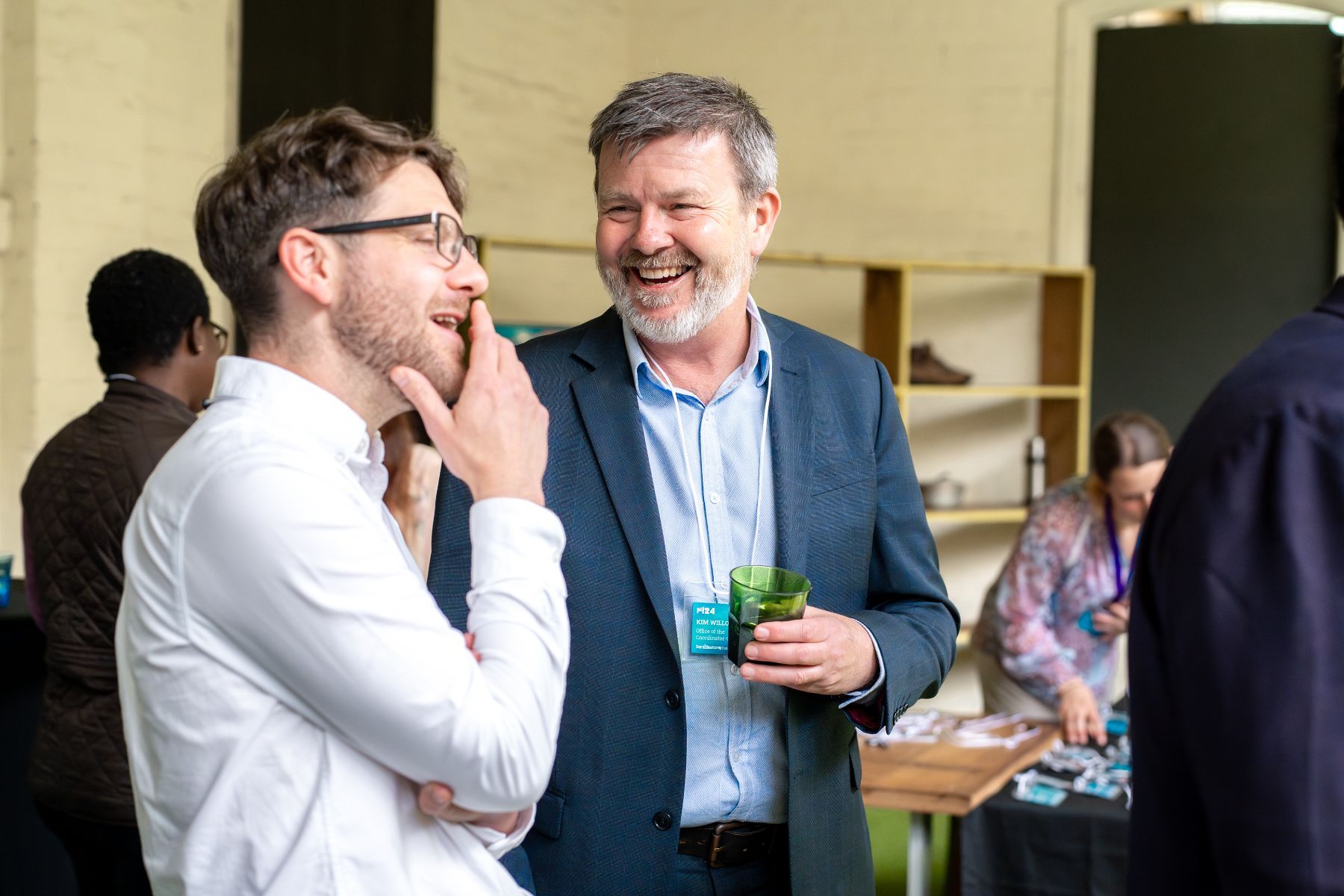 Two people talking at a Startupbootcamp event
