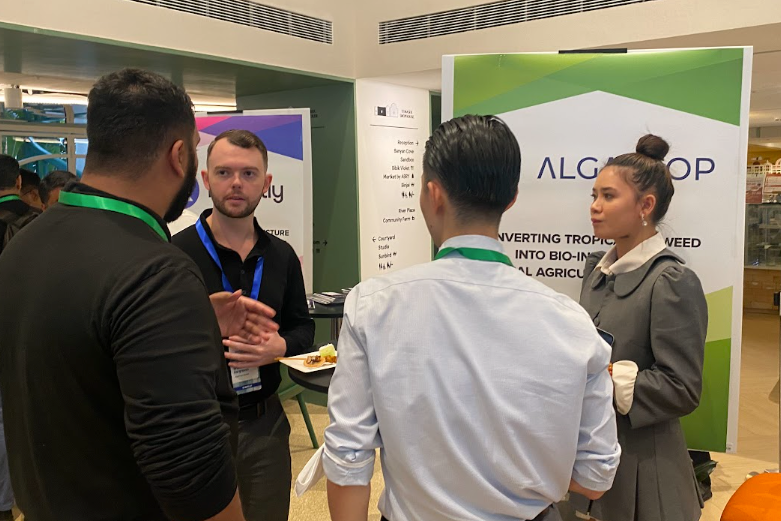 Algatrop founders at their booth at a Startupbootcamp Singapore event
