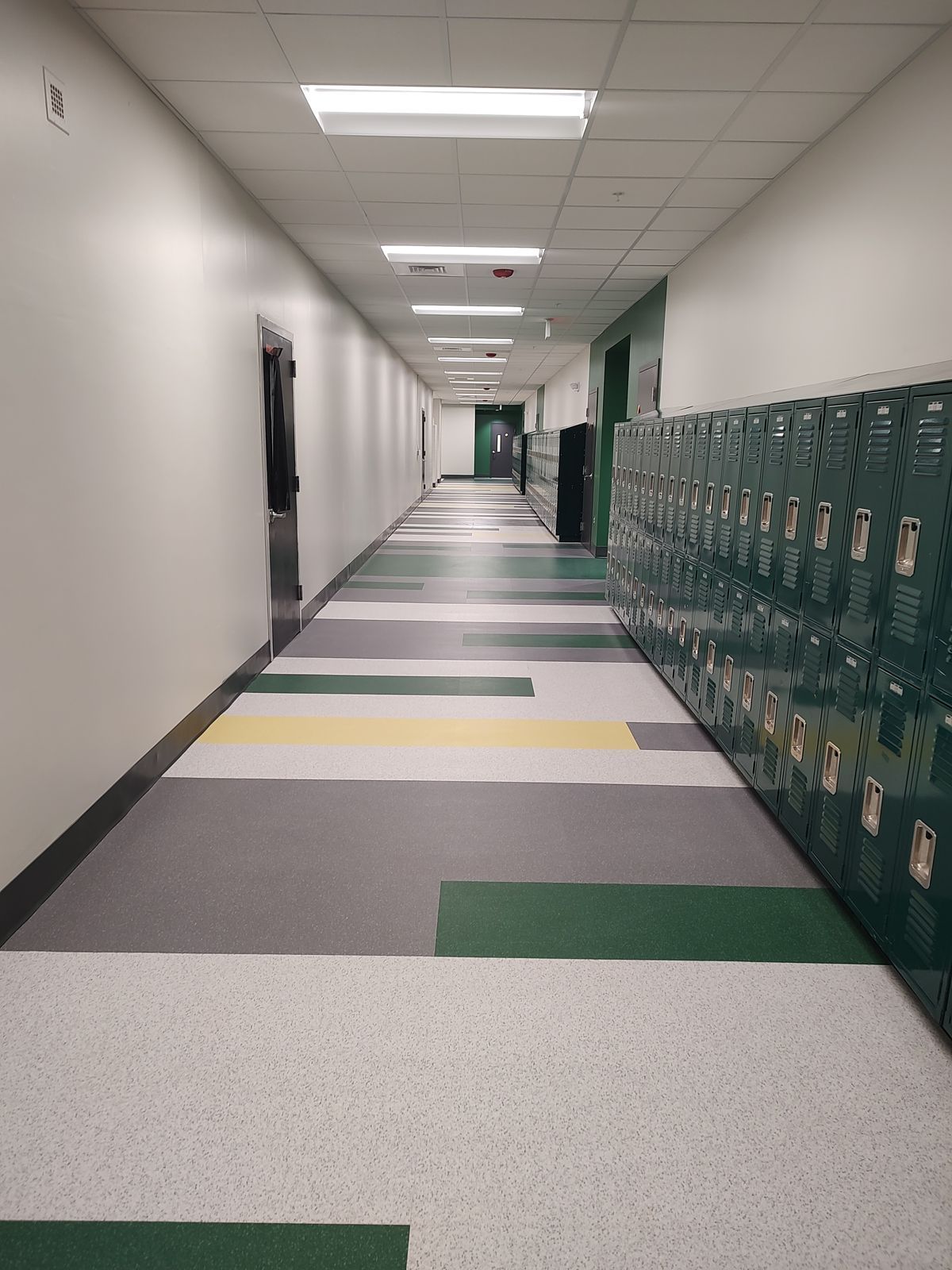 School hallway with lockers after post-construction cleaning by Crystal Clean