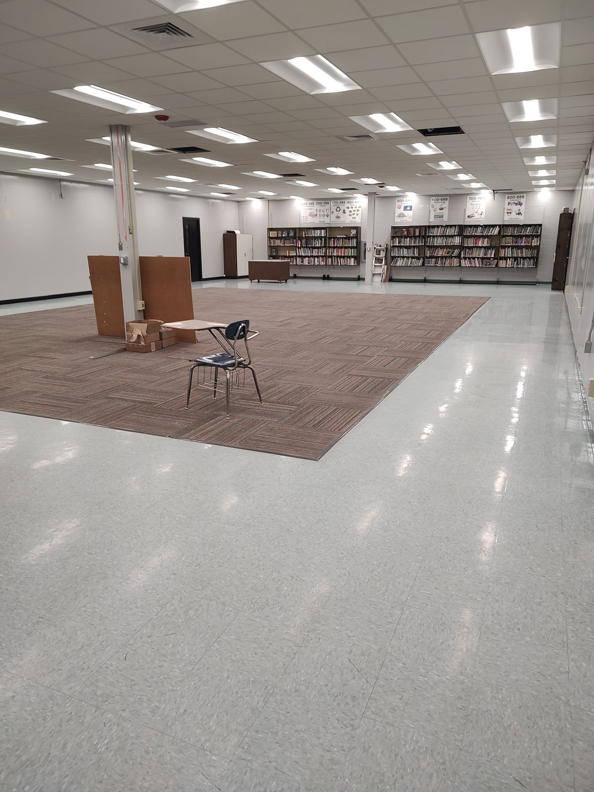 New school library with clean, polished floors after post-construction cleaning