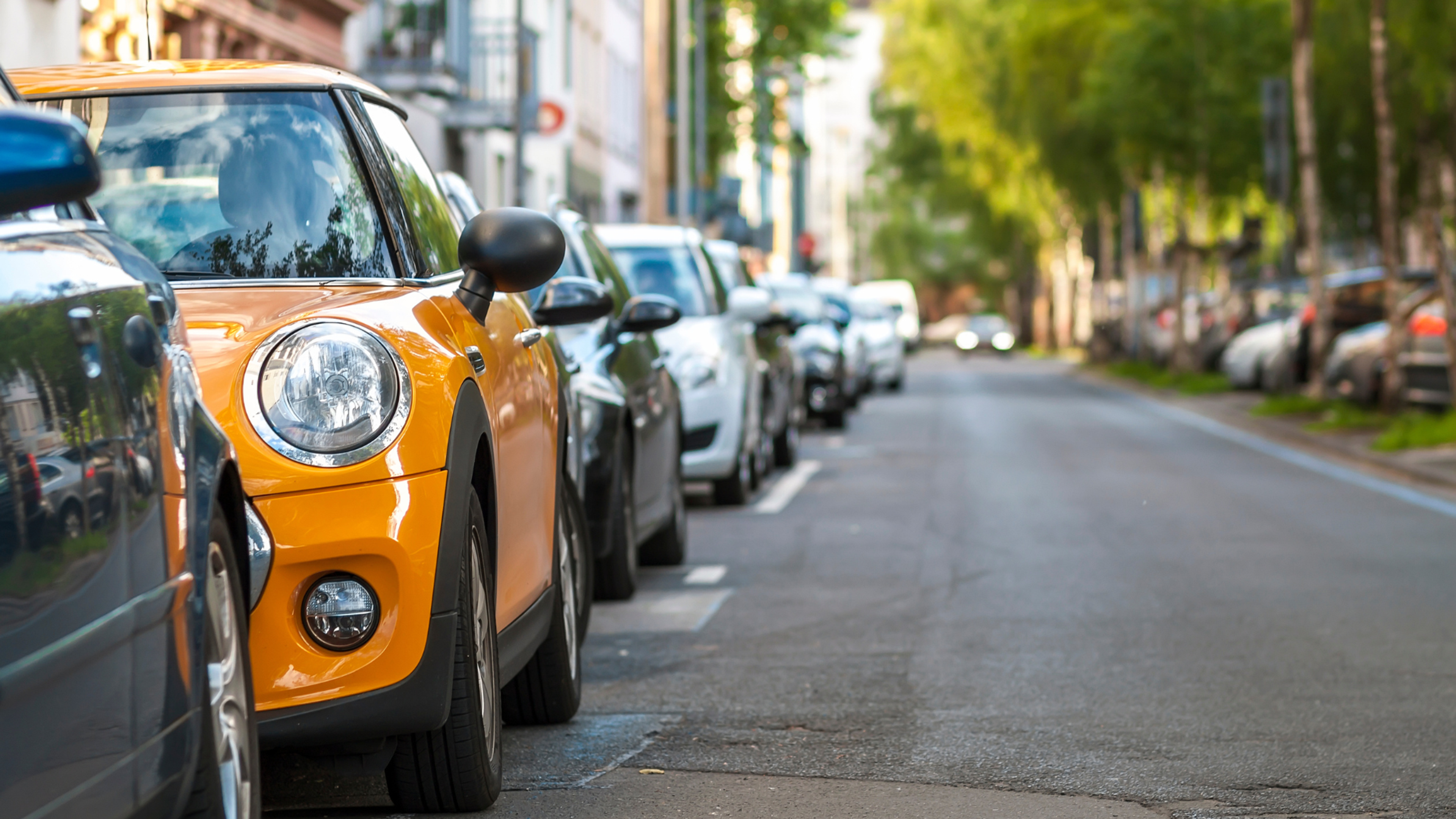 rows of cars parked showing tight street parking in Cronulla