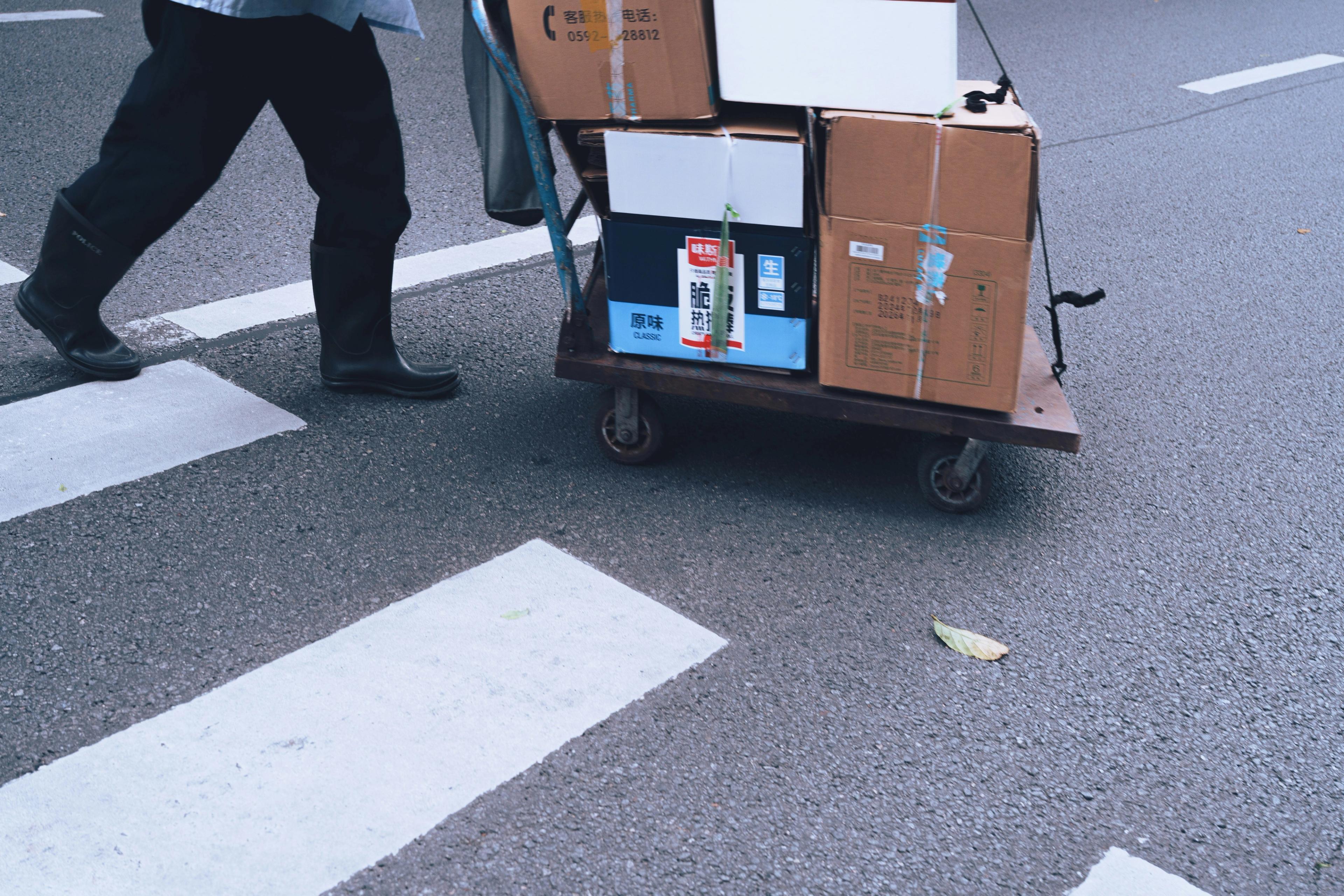 Man moving boxes.