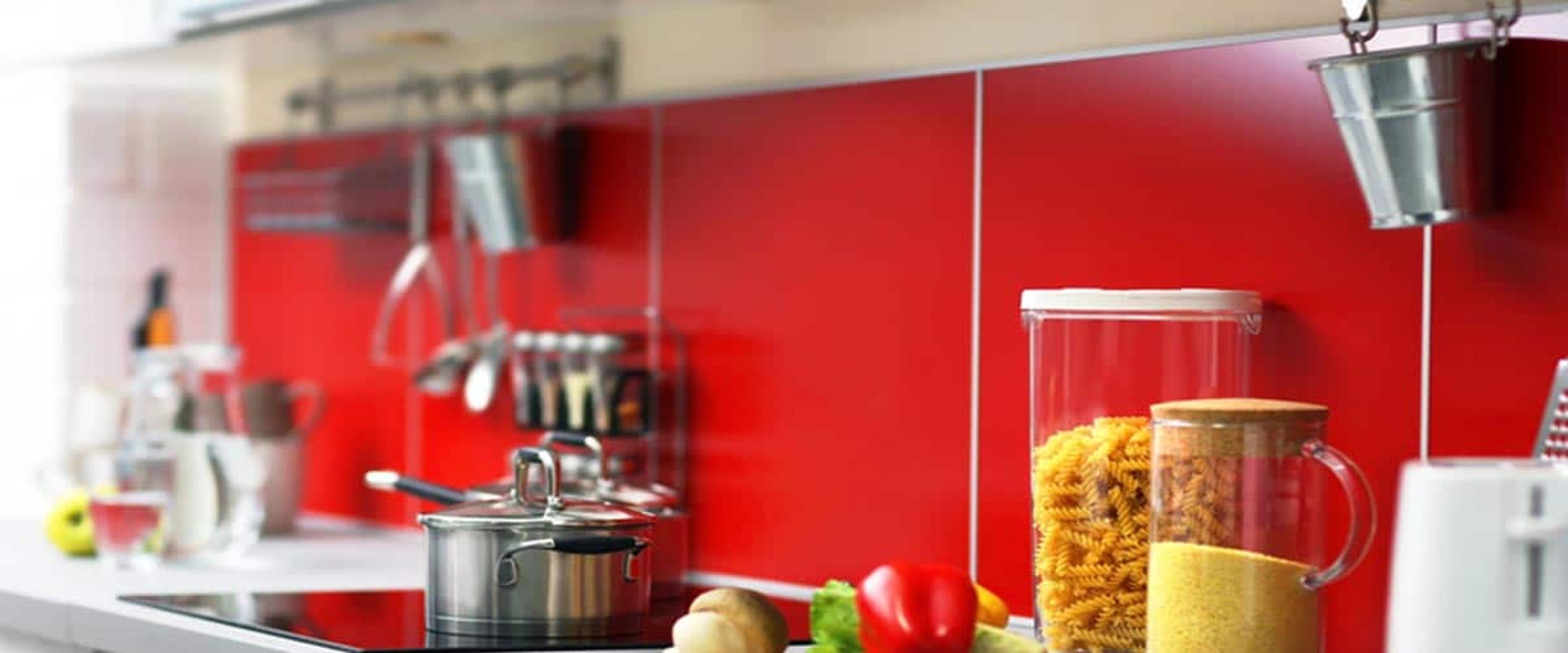 image showcasing essential kitchen items for moving, including cookware, utensils, and food supplies, neatly arranged on a countertop to help during relocation.