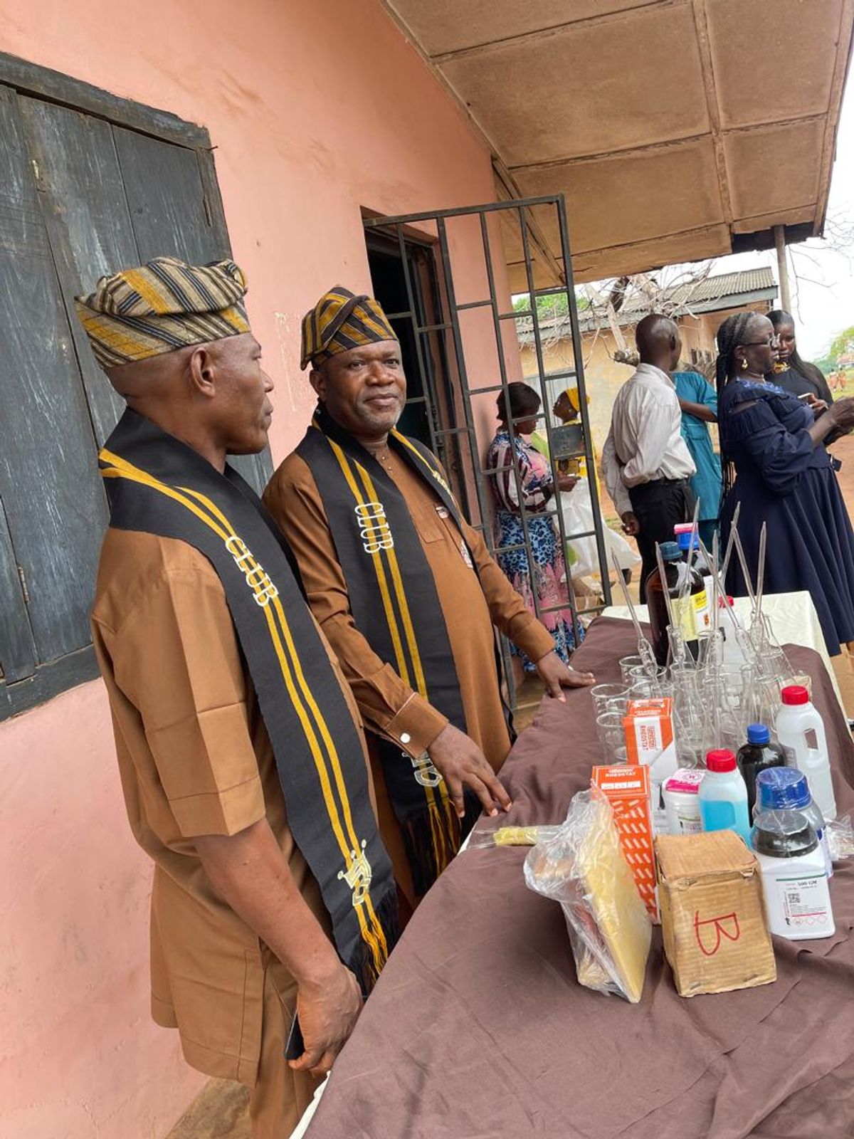Remolanders Social Club representatives alongside the newly donated laboratory materials.