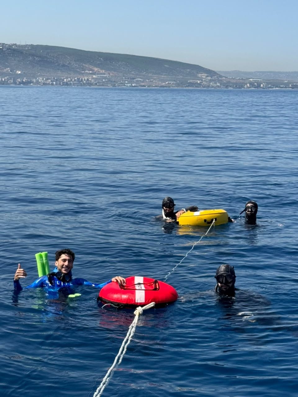 Halime freedivers at the surface with their buoys off the Lebanese coast