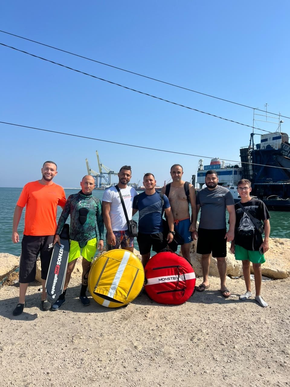 The Halime crew at the port with buoys and fins
