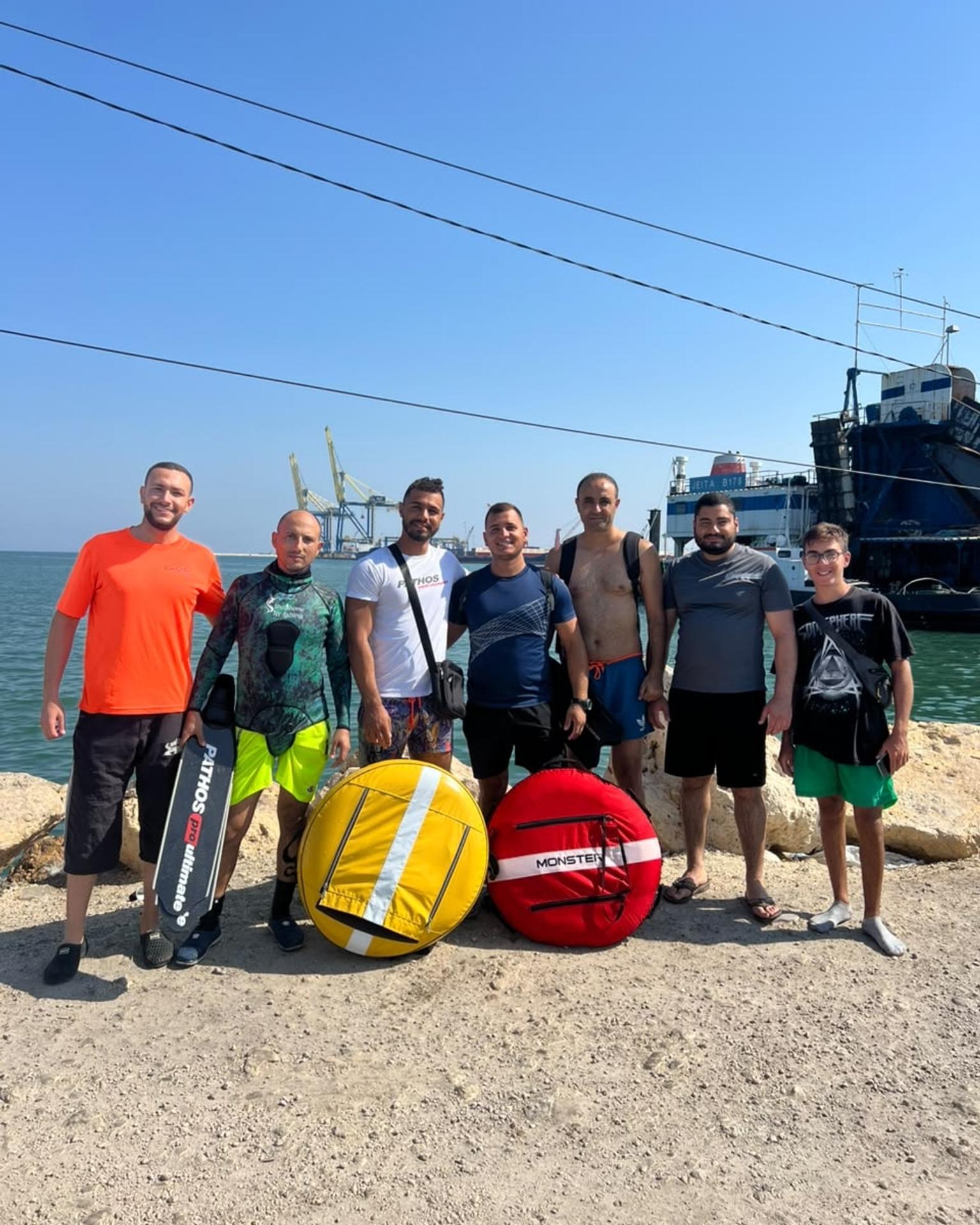 The Halime crew at the port with buoys and fins
