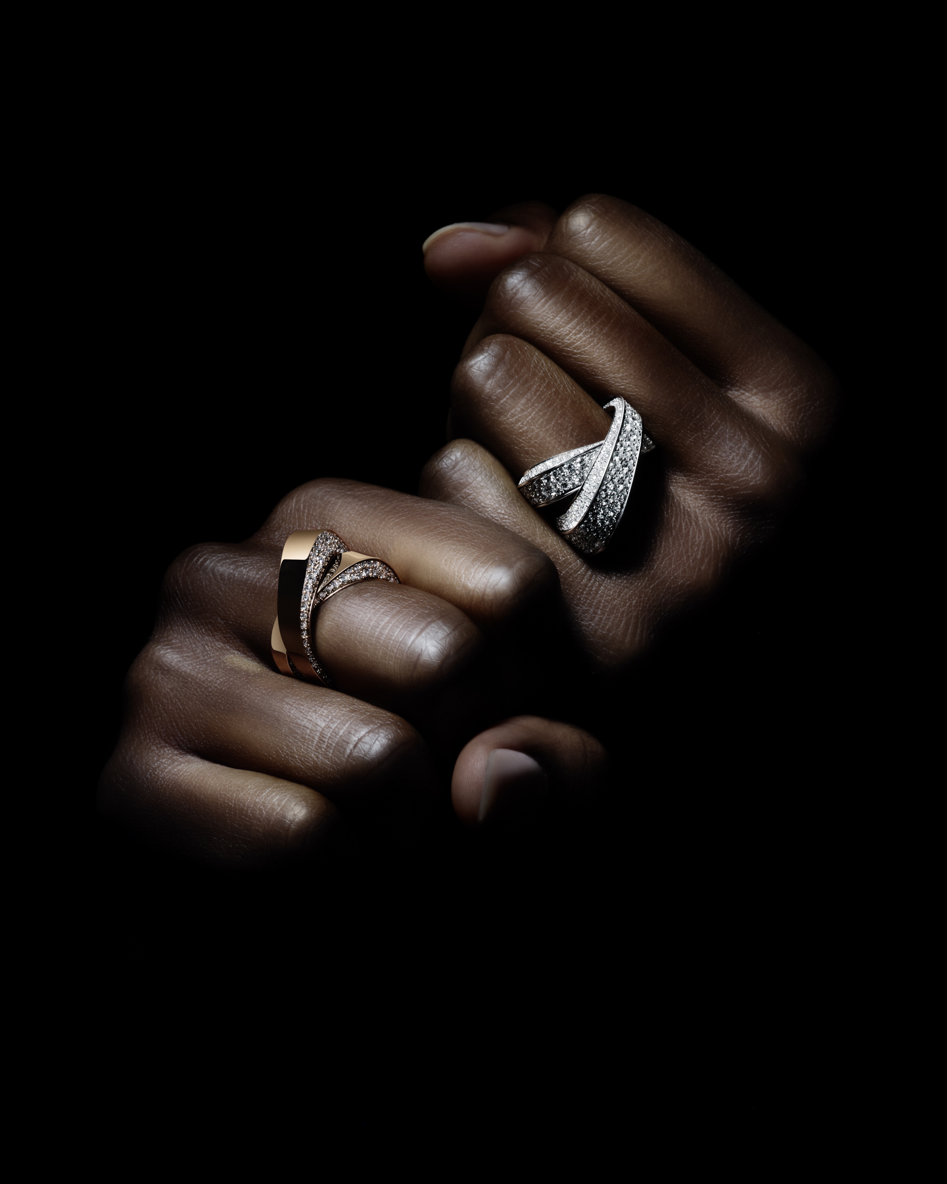 Infinite rings crafted in 18k recycled gold with a choice in pave setting.