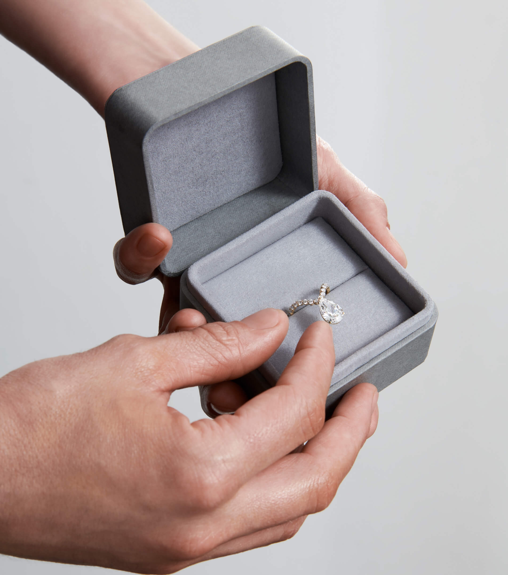 A surprise awaits: a sparkling ring nestled inside a gift box.