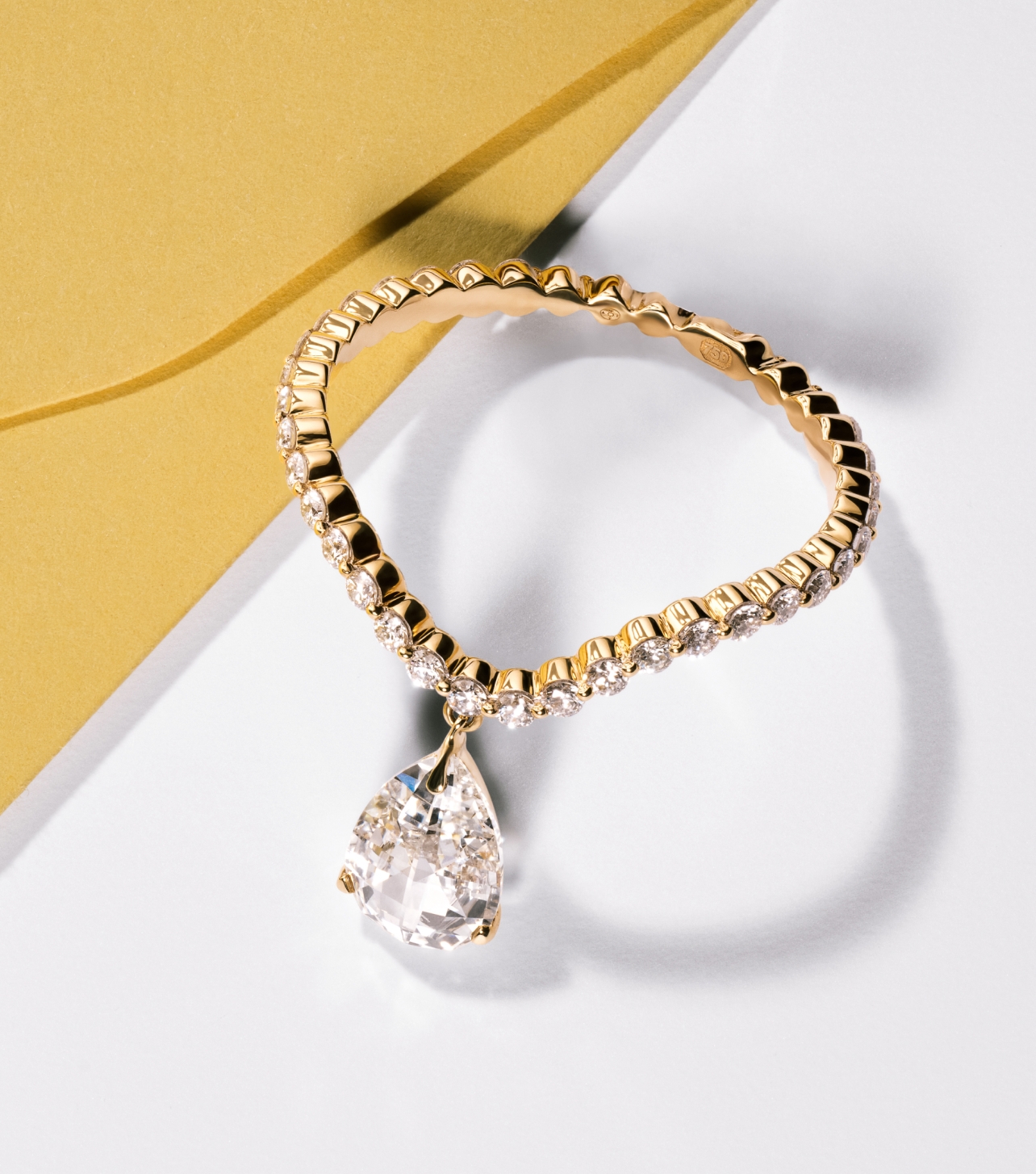 Tear signature cut lab-grown diamond ring crafted in 18k recycled gold. 