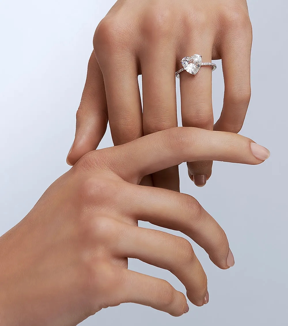 Unsaid's signature cut heart shaped lab-grown diamond Whirlwind ring crafted in18k white gold. 